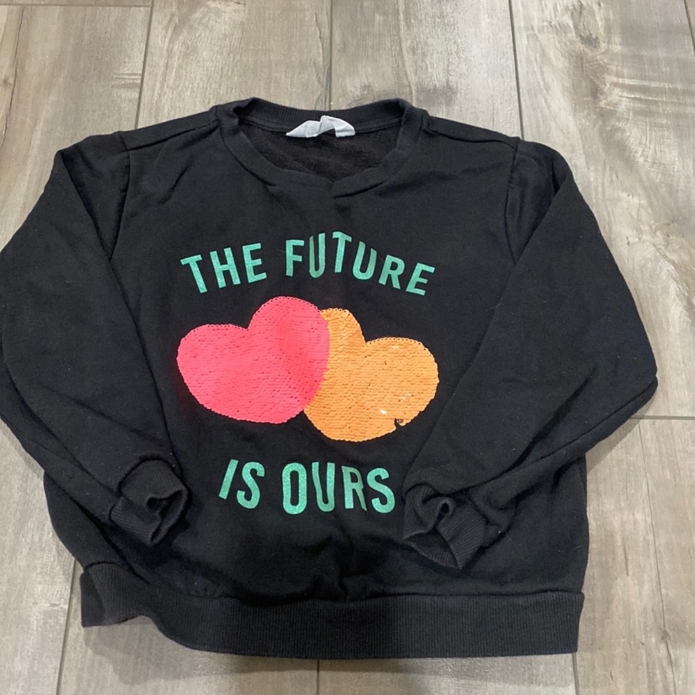 H&M fleece in Black with Sequins. Size 6-8 years